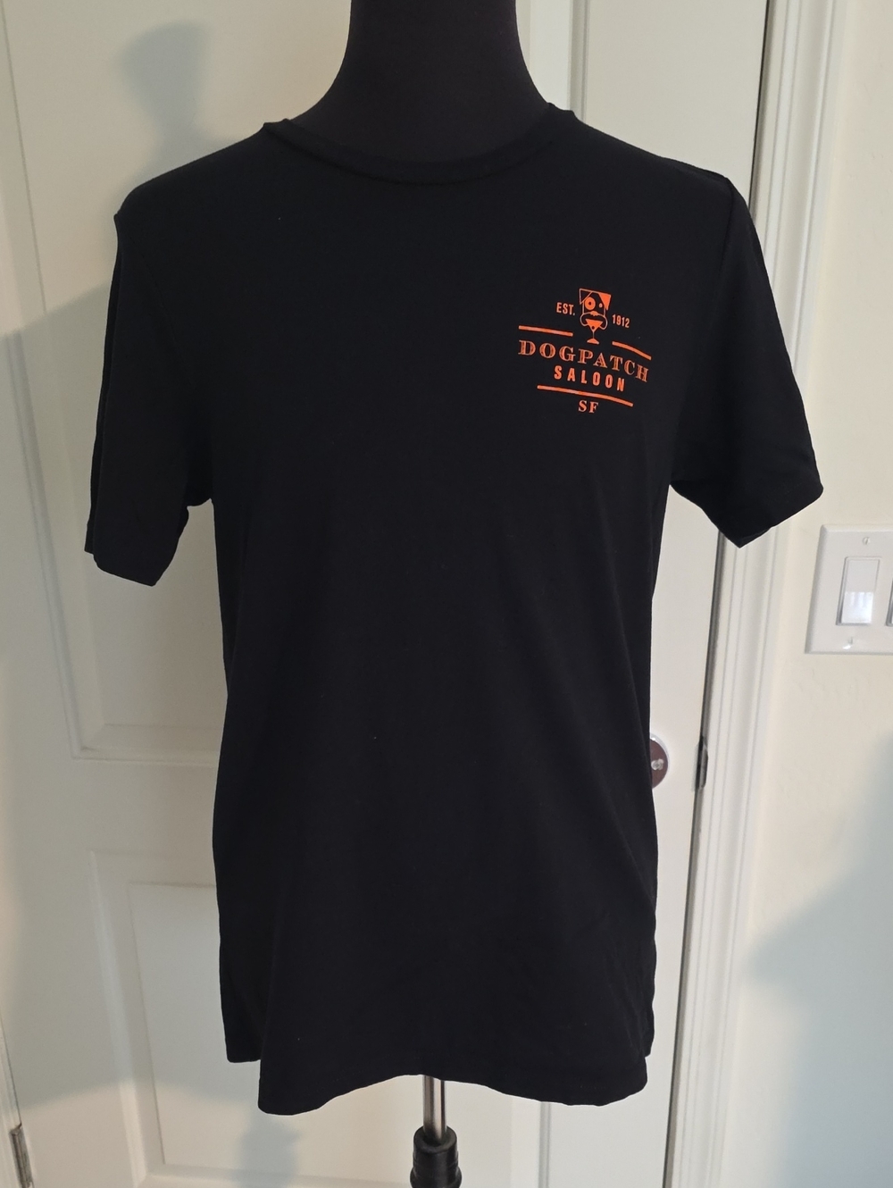Bella Canvas Black Short Sleeve Tee with Orange Dogpatch Saloon Logo